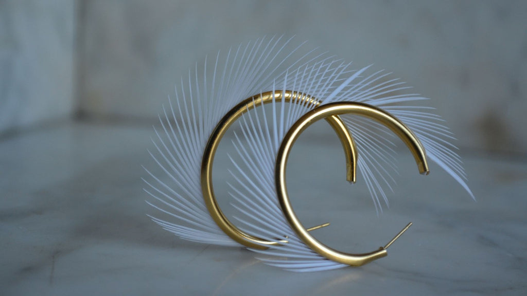 Boucles d'oreilles plumes oie iroquoise crème