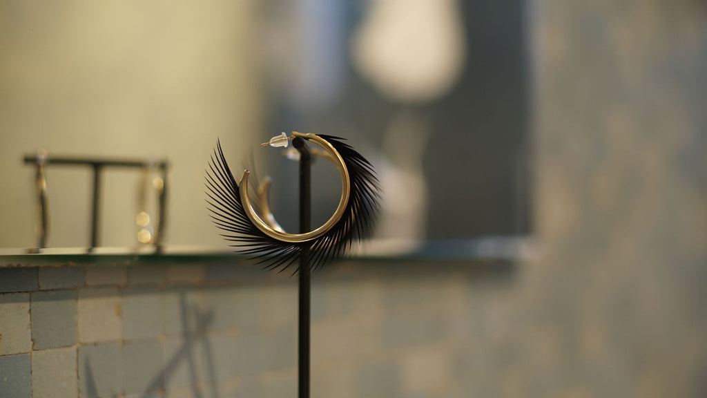 Boucles d'oreilles plumes oie iroquoise noir