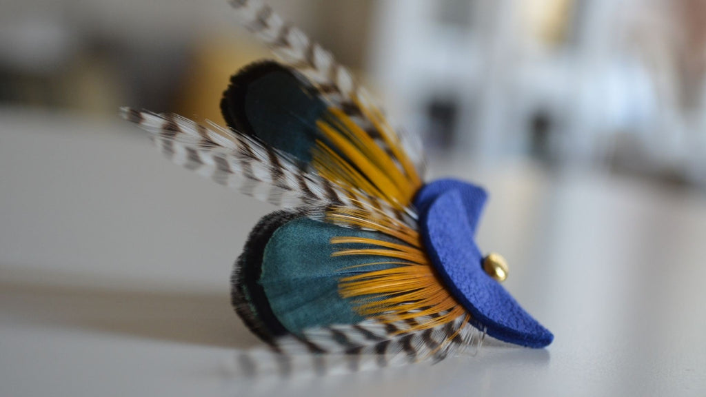 Boucles d'oreilles plumes paon nomades bleu